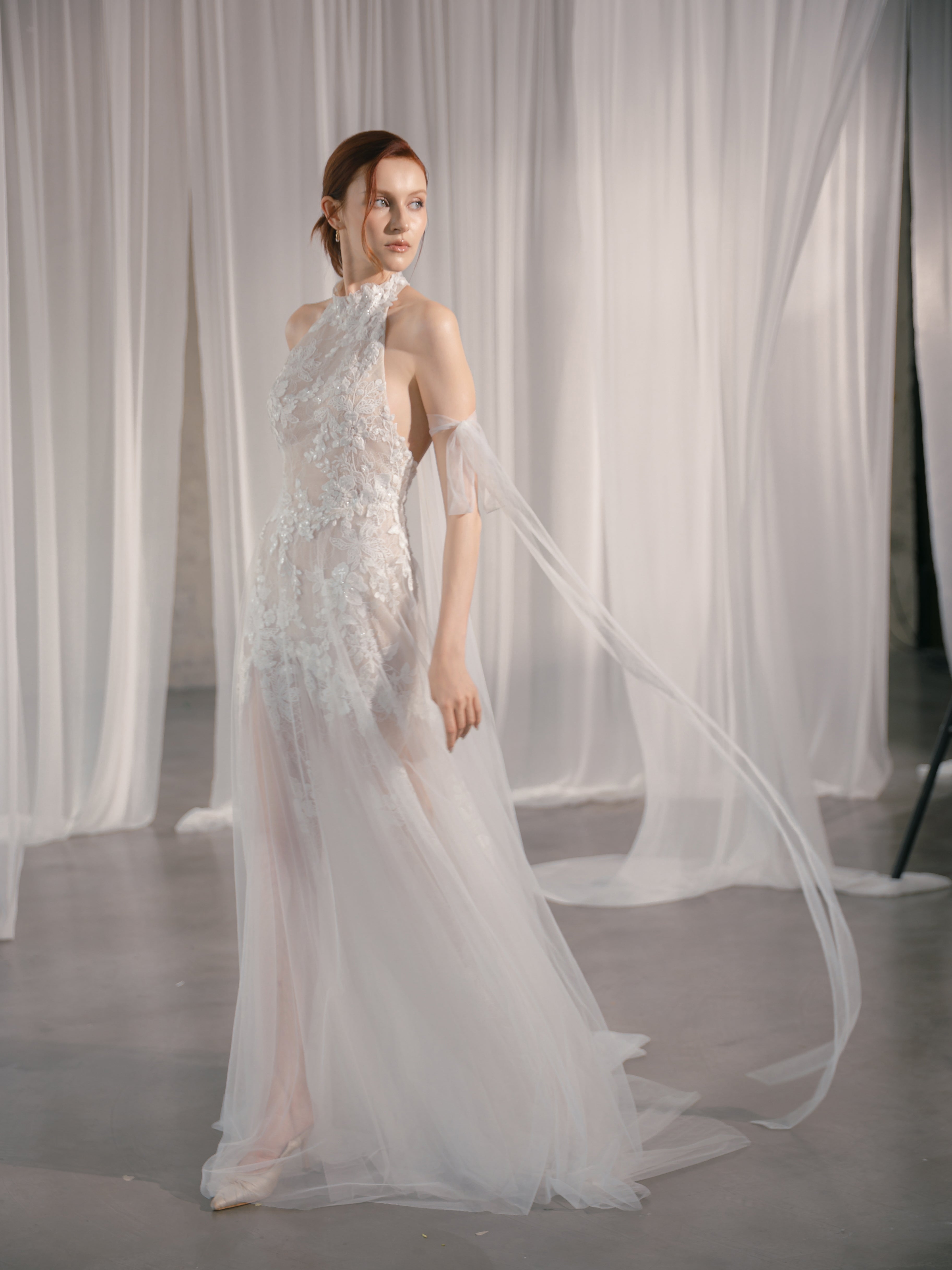 Halter-neck wedding dress with hand-shaped lace flowers and delicate embroidery Selena Gomez