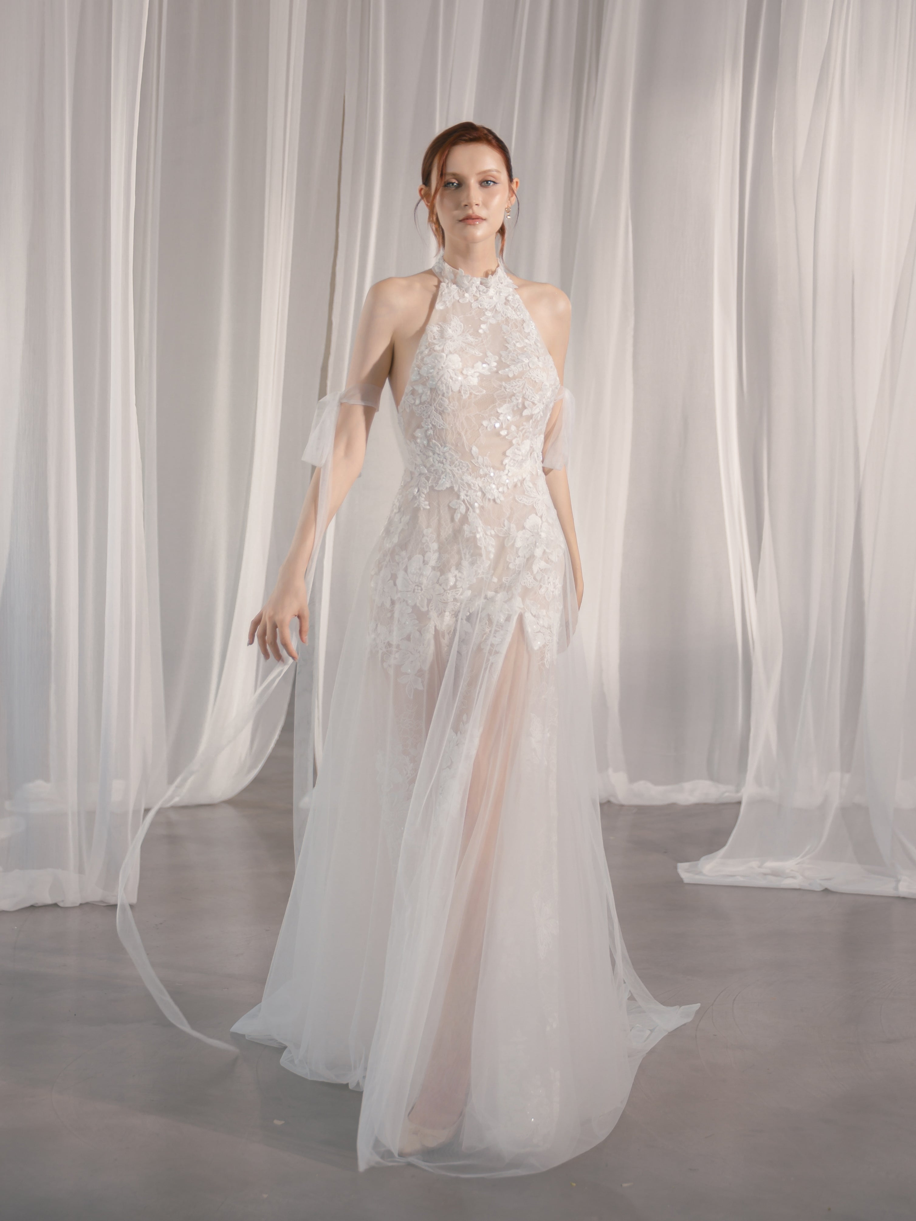 Halter-neck wedding dress with hand-shaped lace flowers and delicate embroidery Selena Gomez