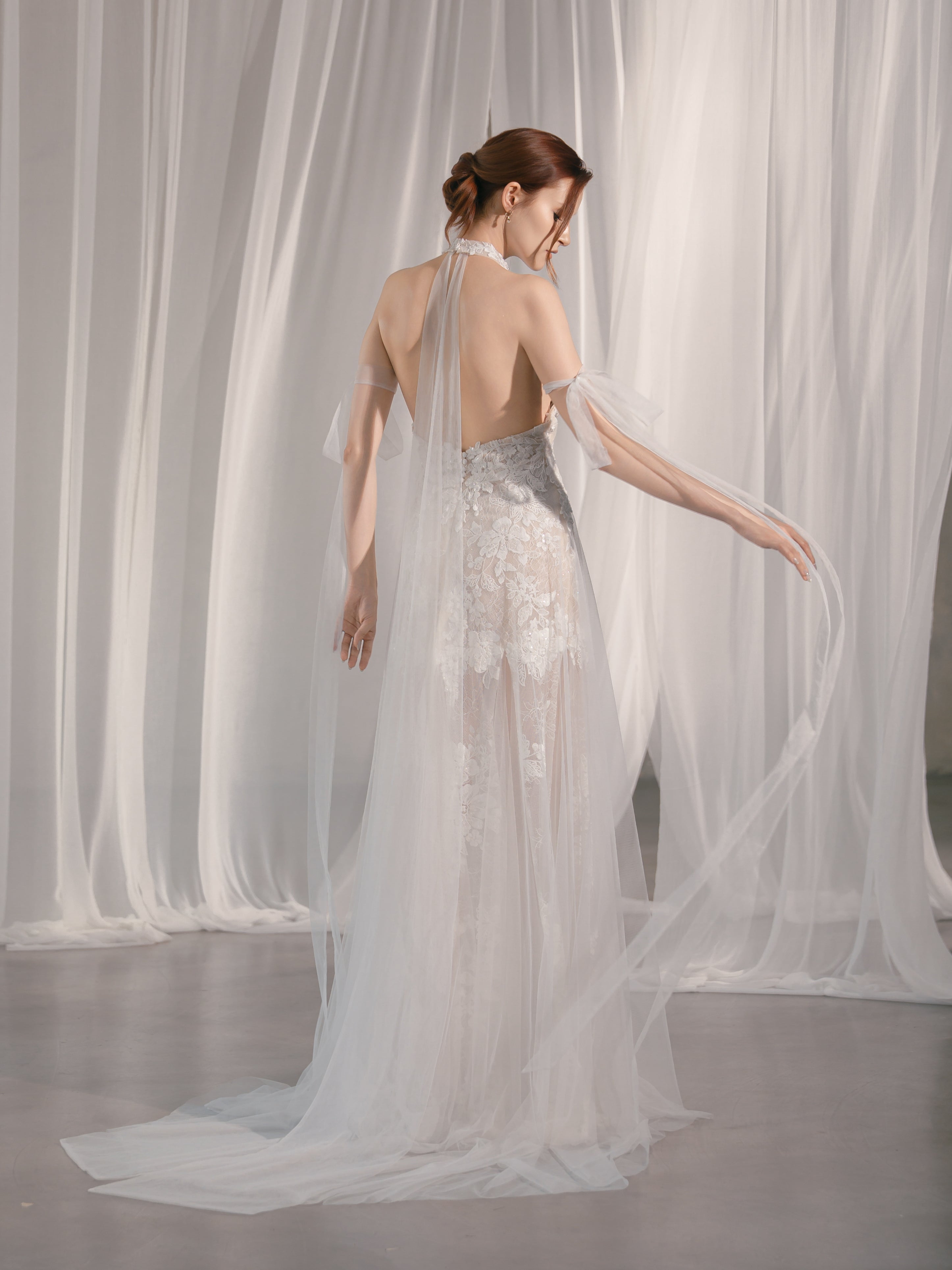 Halter-neck wedding dress with hand-shaped lace flowers and delicate embroidery Selena Gomez