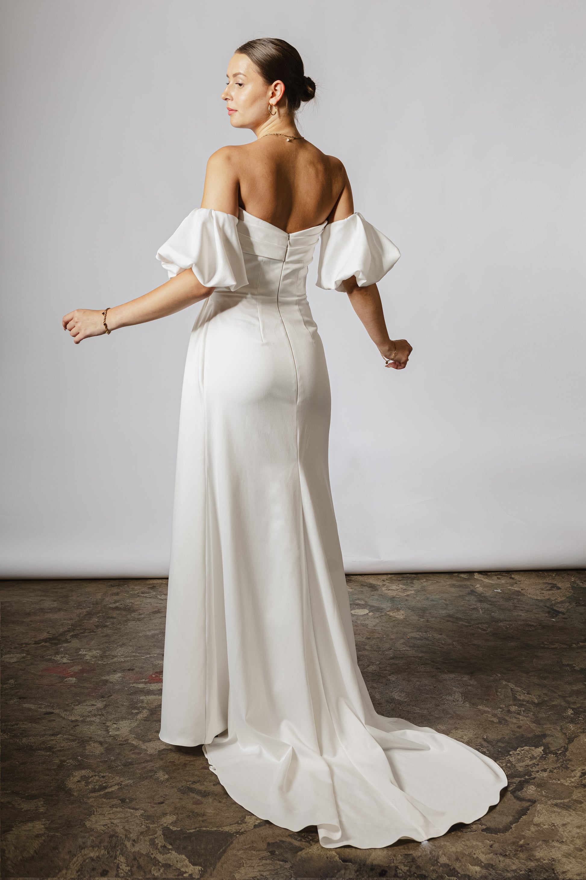 Wedding dress with romantic puff sleeves for modern brides