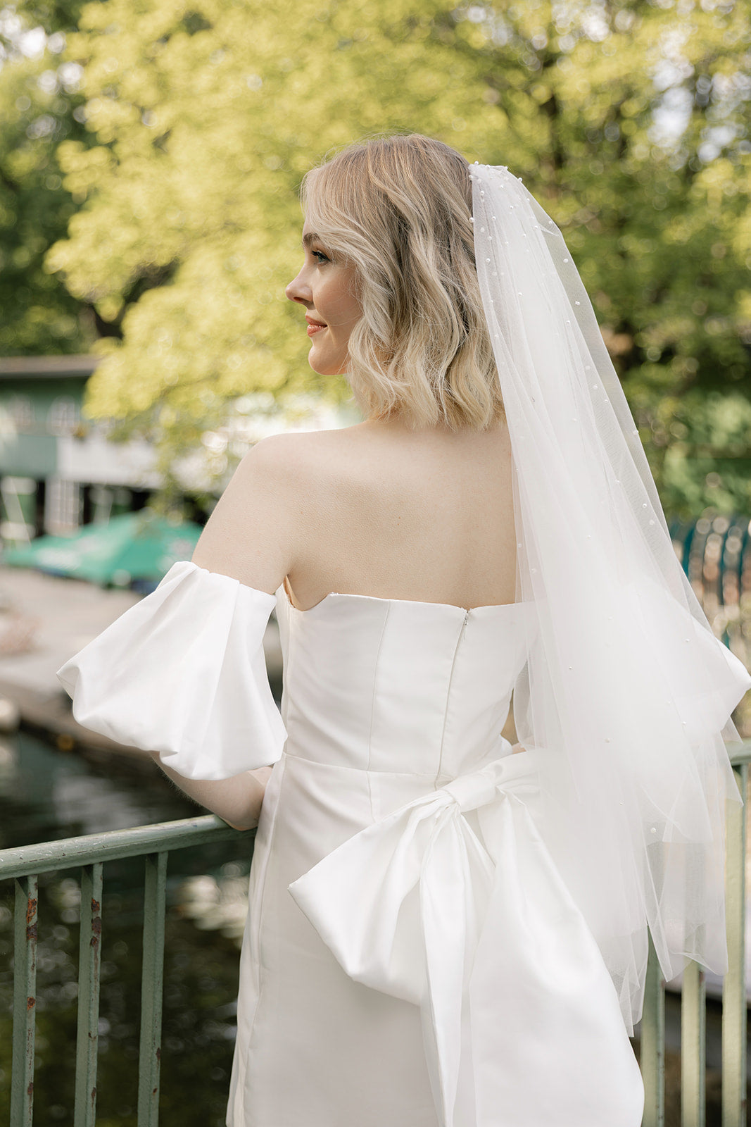 Wedding dress with romantic puff sleeves for modern brides