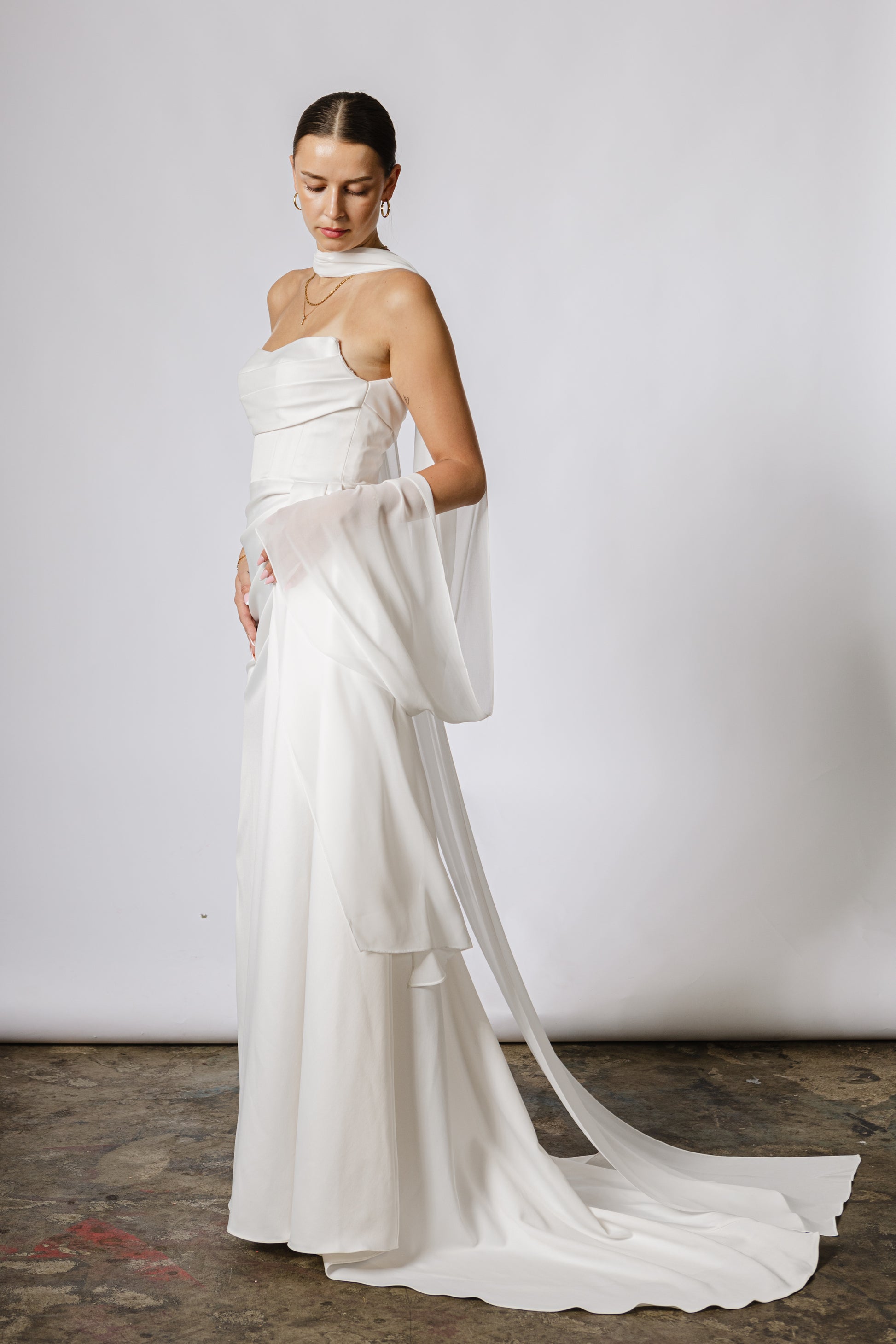 Lightweight bridal cape made of soft chiffon for an ethereal wedding look