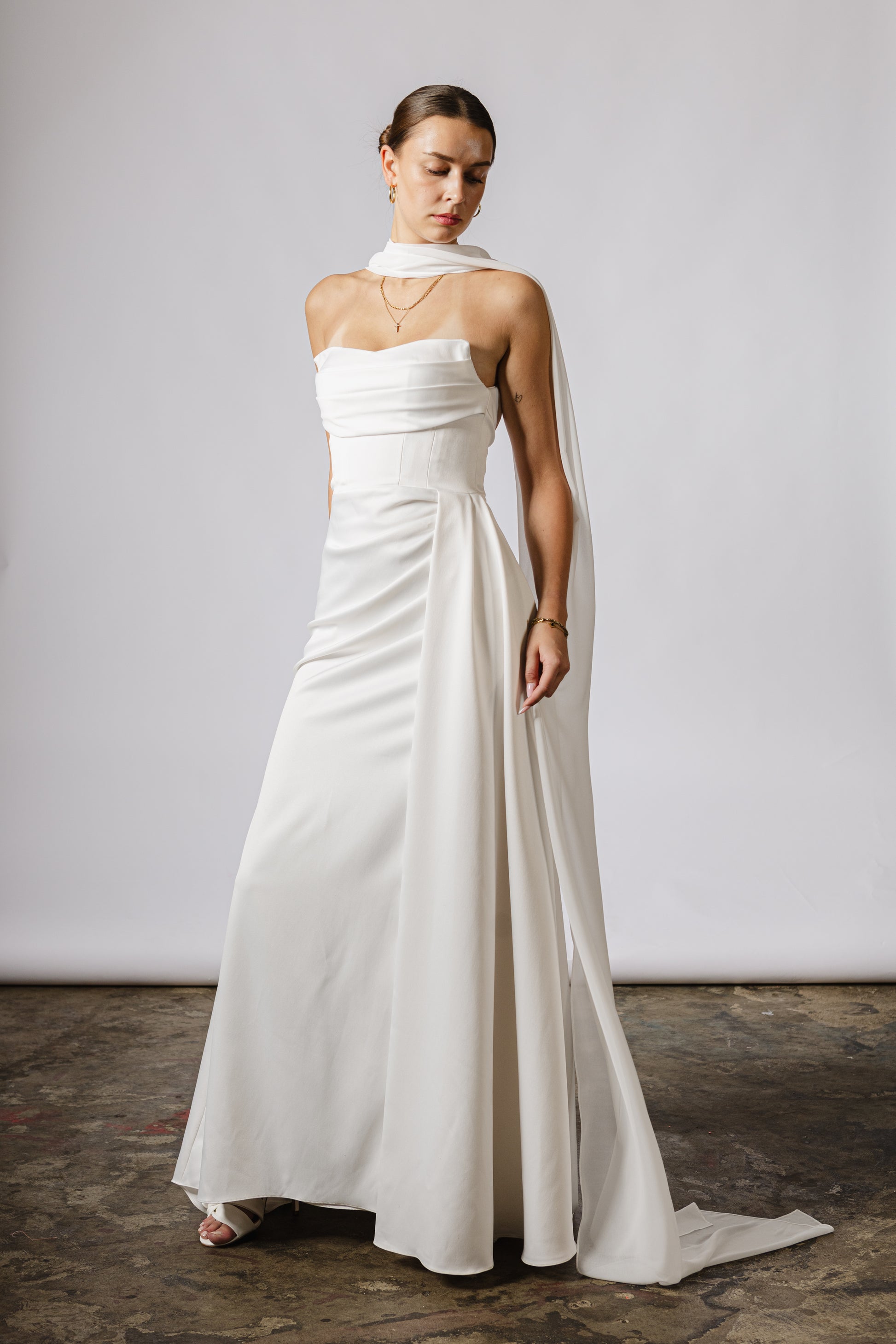 Lightweight bridal cape made of soft chiffon for an ethereal wedding look
