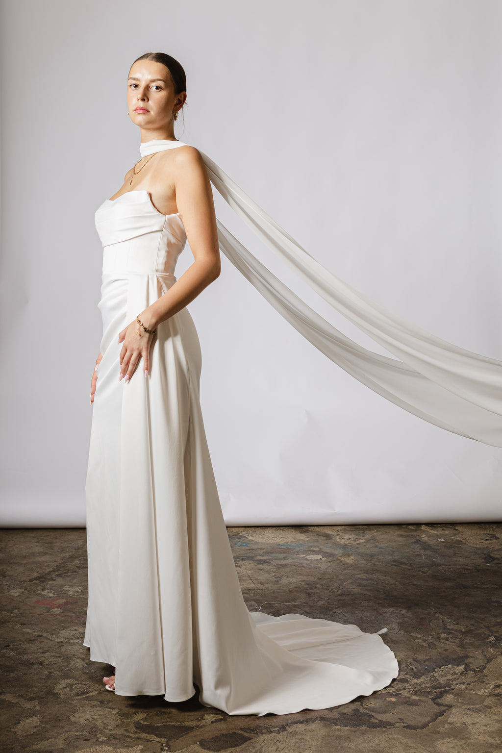 Lightweight bridal cape made of soft chiffon for an ethereal wedding look