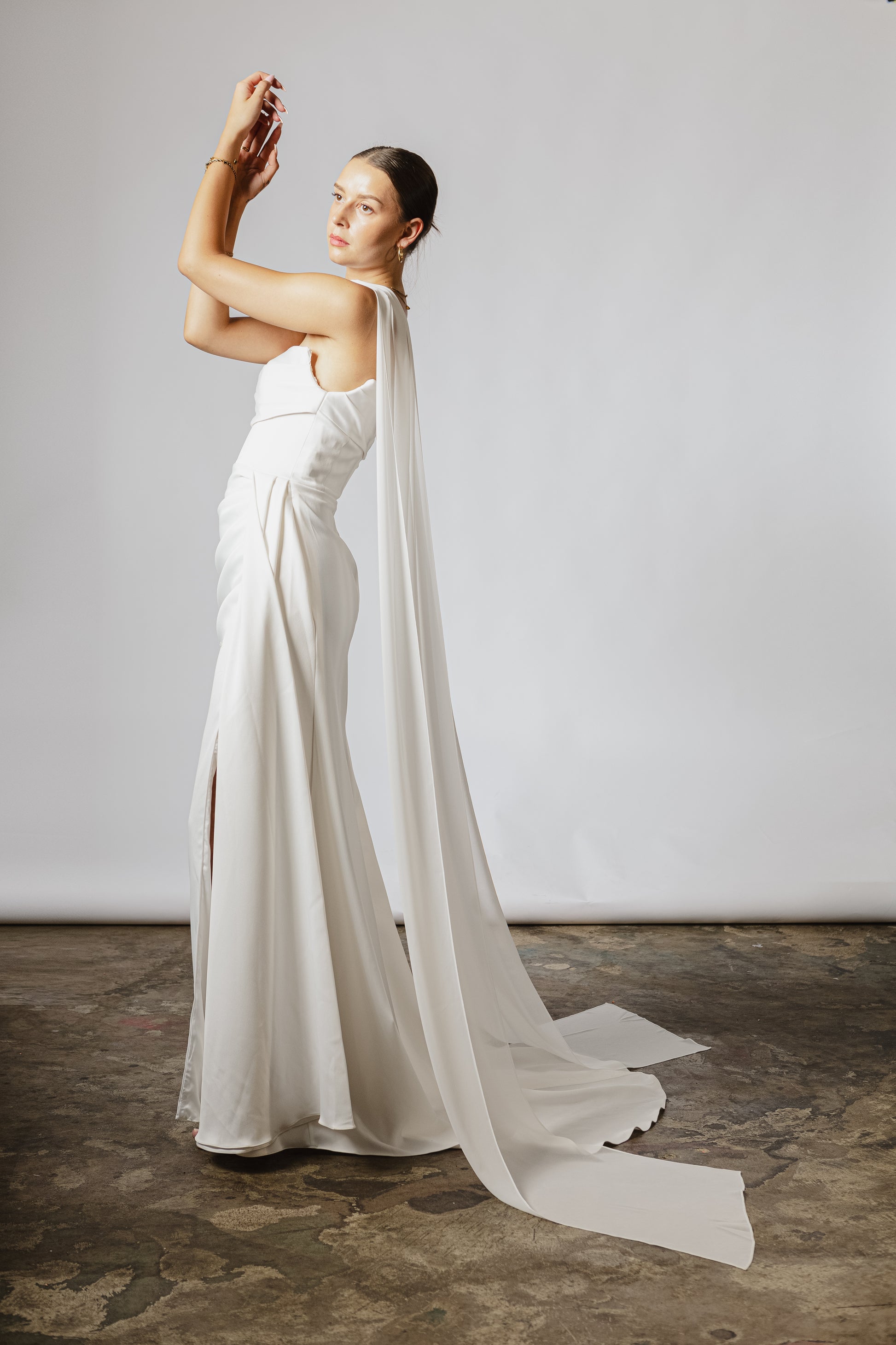 Lightweight bridal cape made of soft chiffon for an ethereal wedding look