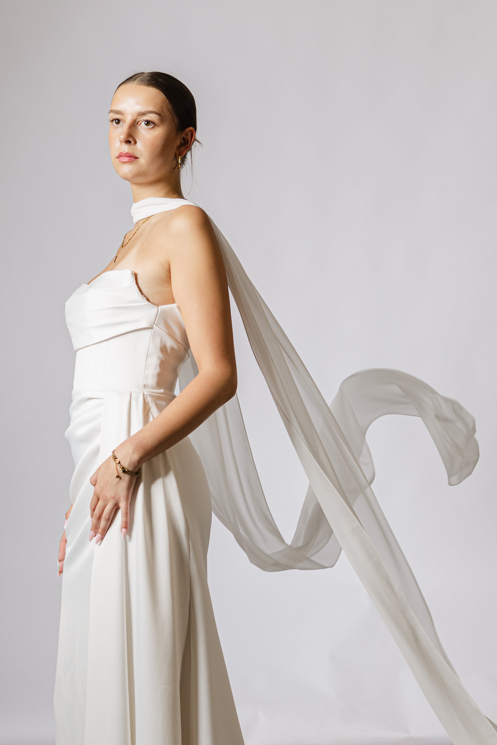Lightweight bridal cape made of soft chiffon for an ethereal wedding look