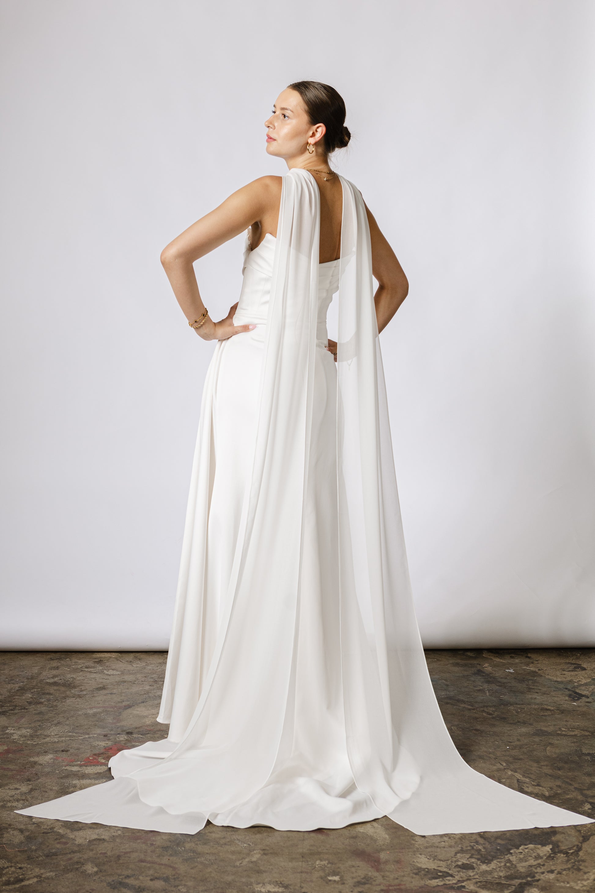 Lightweight bridal cape made of soft chiffon for an ethereal wedding look